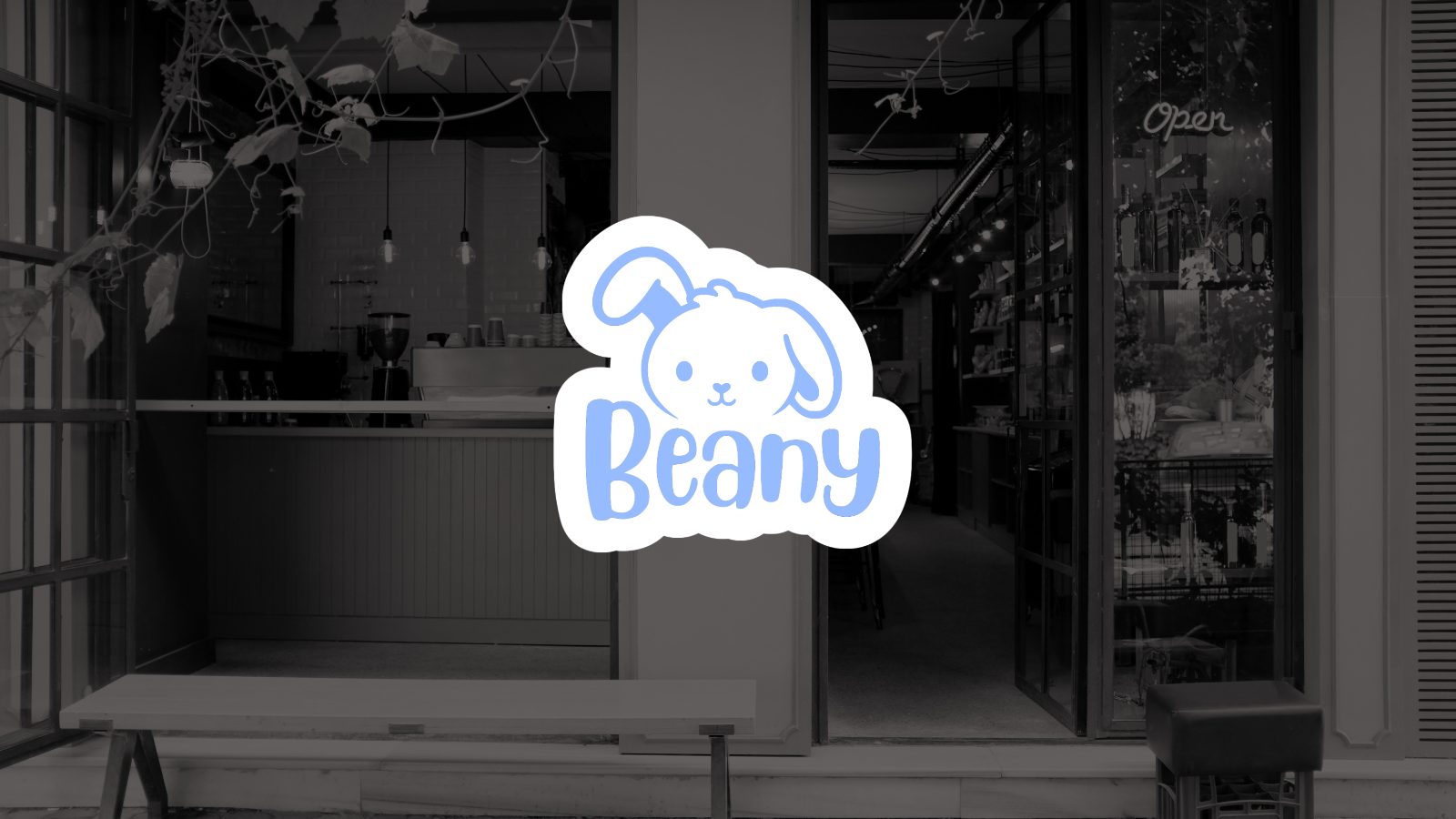 Beany sticker logo on a café storefront